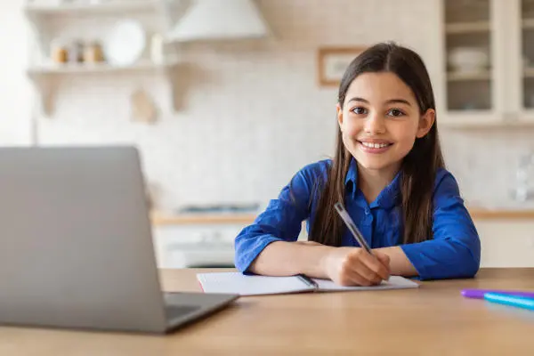 Girl Studying at Desk